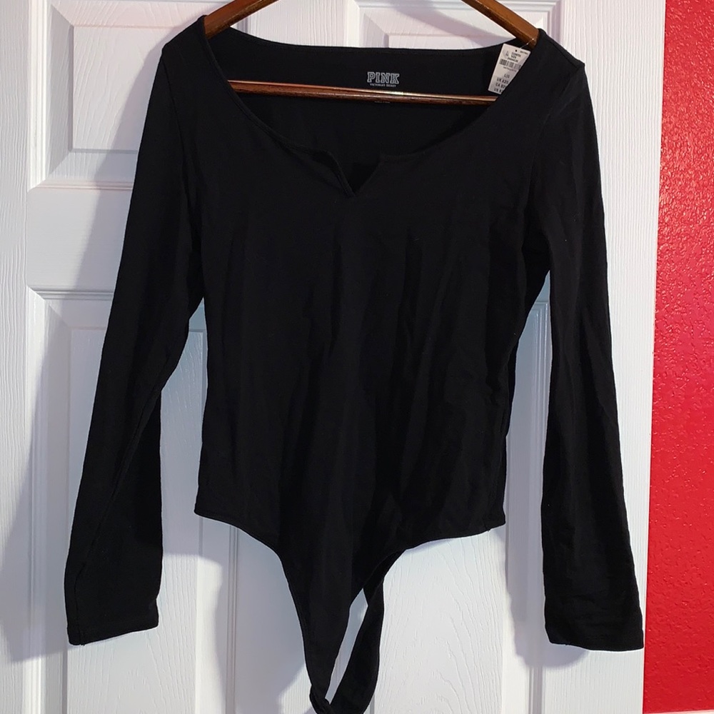 Pink Victoria’s Secret black bodysuit
